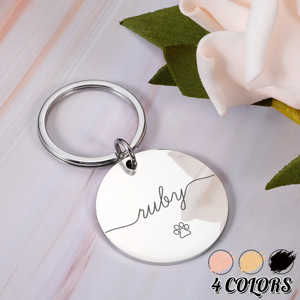 Round-shaped identification tag for dogs and cats - silver color