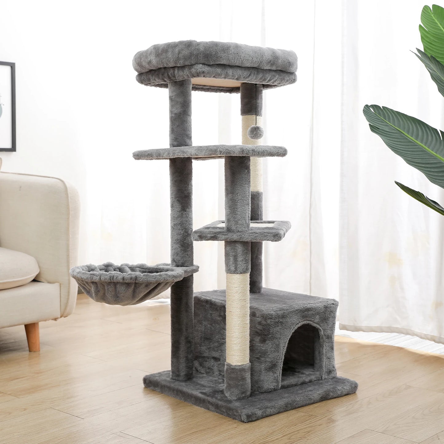 Gray cat tree with a niche and two baskets